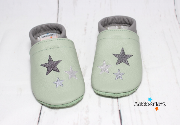 Lederpuschen mit Sternen