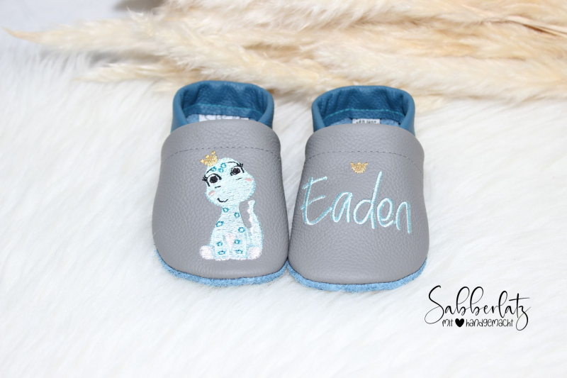 Dino mit Krone-Puschen