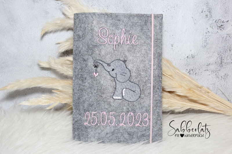 U-Heft-Hülle Elefant mit Herzanhänger